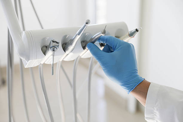 Professional Tooth Extraction technician working in Mendon, IL